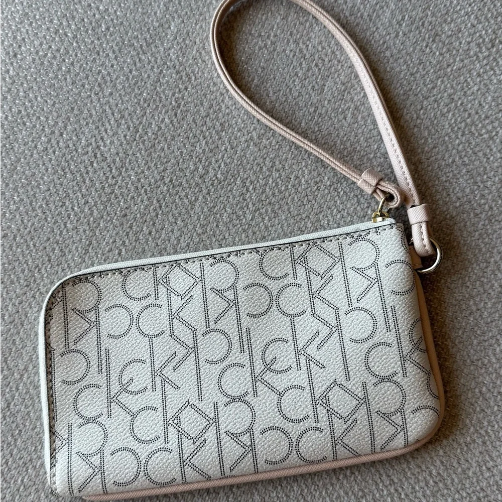 Calvin Klein Signature Pattern Wristlet in Cream and Tan